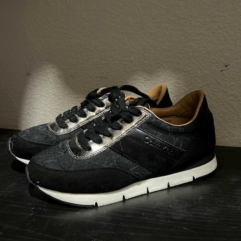 Used Calvin Klein black sneakers size 6.5